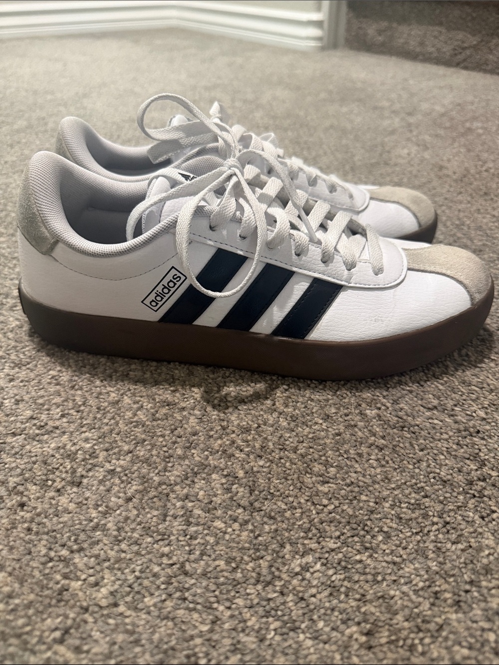 Adidas White Sneakers with Black Three Stripes and Gum Sole